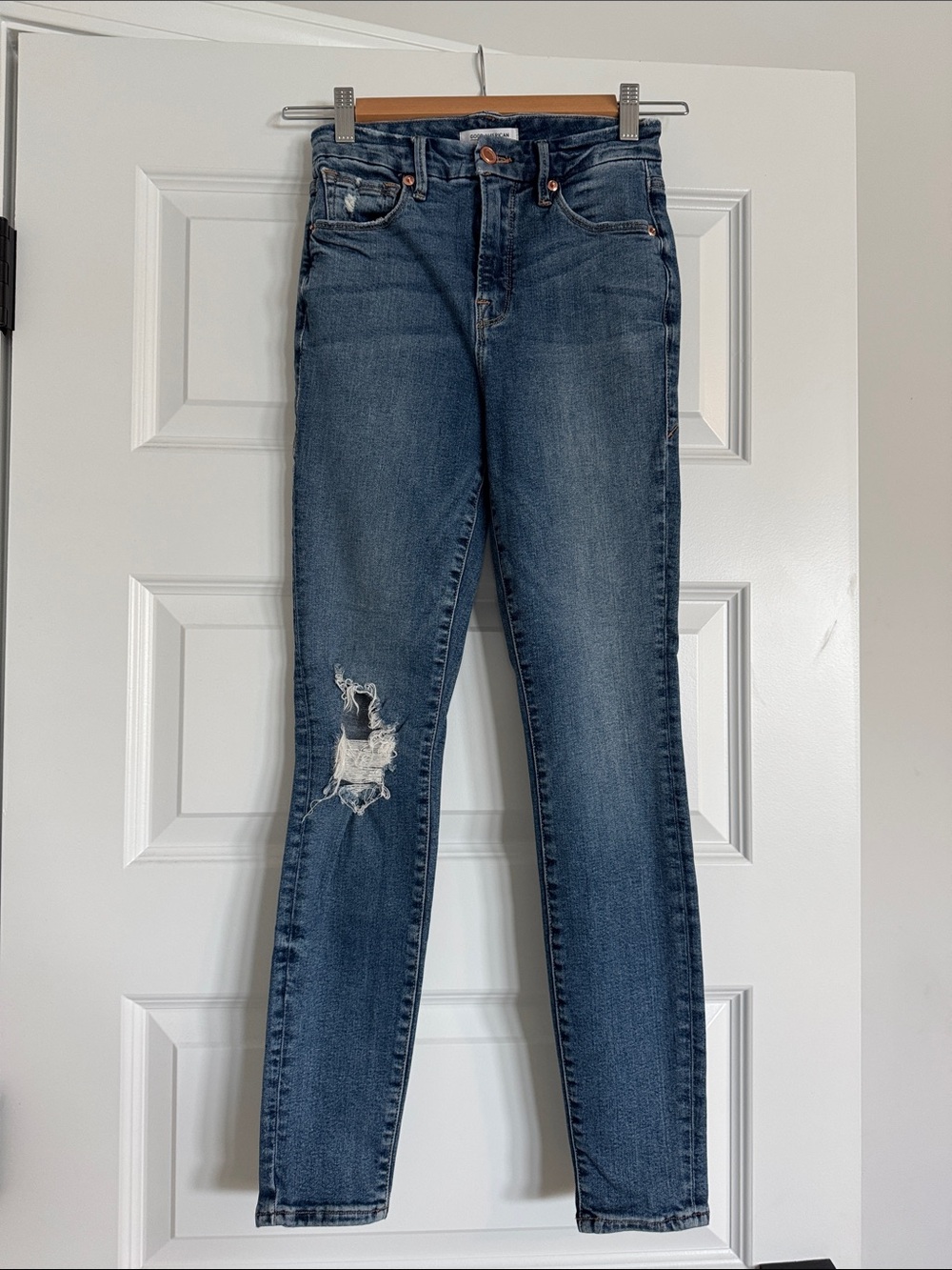 Good American- “Good Waist” Skinny Distressed Jeans in Classic Blue Wash